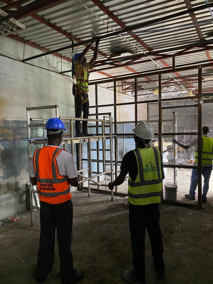 MOJATECH team in safety gear on the Flour Mills Nigeria electrical project